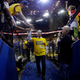 Young fans give high-fives to their idol, the star of the Golden State Warriors, Joe Lacob. (Photo credit: Marcio Jose Sanchez/AP)